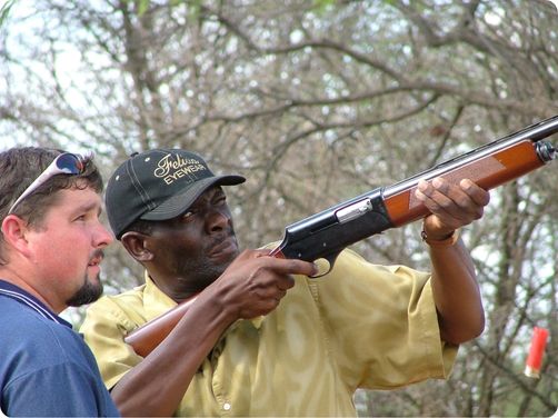 Man Shooting Clay Pigeon